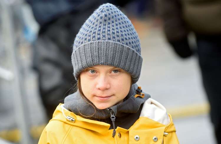 Climate change activist Greta Thunberg attends a news conference during a Fridays for Future protest in Turin, Italy, on December 13 2019.
