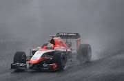 Marussia Formula One driver Jules Bianchi of France drives during the Japanese F1 Grand Prix at the Suzuka Circuit