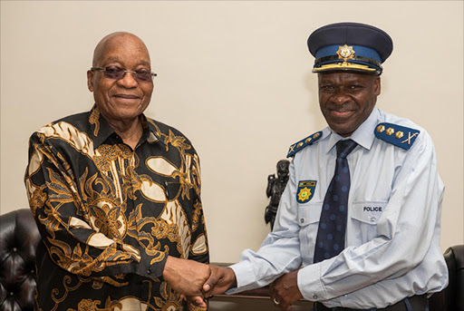 President Jacob Zuma and Minister of Police Mr Fikile Mbalula with the newly appointed National Police Commissioner General Khehla John Sitole, following his appointment Picture: Ntswe Mokoena (GCIS)