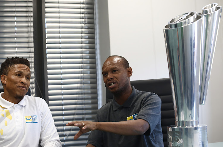 Former Bafana Bafana players and current MTN8 ambassadors Josta Dladla (L) and Jabu Mahlangu at the Tiso Blackstar offices in Parktown, Johannesburg on September 12 2019.