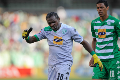 Bevan Fransman and Patrick Tignyemb of Bloemfontein Celtics during the Absa Premiership match between Bloemfontein Celtic and Mamelodi Sundowns at Free State Stadium on September 14, 2014 in Bloemfontein, South Africa.