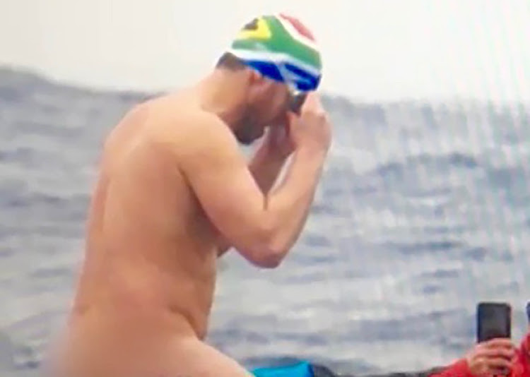 SA swimming endurance athlete Cameron Bellamy prepares to plunge into icy waters buck naked.