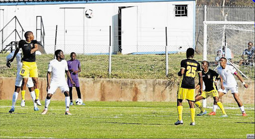 ON TARGET: Mazwi Mncube of Mthatha Bucks goes for a header during their match against Stellenbosch FC at the weekend. Bucks won 3-1, with Mncube scoring one goal from a spot kick Picture: ZINGISA MVUMVU