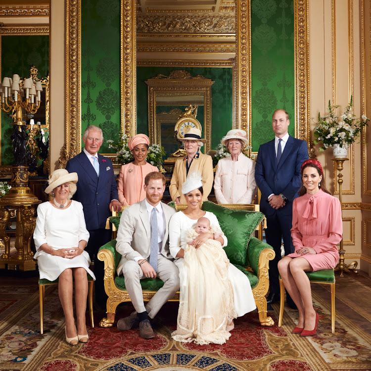 Archie Mountbatten-Windsor and his parents, the Duke and Duchess of Sussex, on the day of his christening, July 6 2019, at Windsor Castle, United Kingdom. Guests included, from left, Camilla, Duchess of Cornwall, Prince Charles, Doria Ragland, Lady Jane Fellowes, Lady Sarah McCorquodale, Prince William, and Catherine, Duchess of Cambridge.