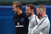 England's Harry Kane and England manager Gareth Southgate during training. 
