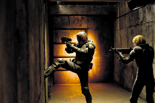 LAW AT THE DOOR: Karl Urban plays the titular hero in 'Dredd', a film based on the much heralded 2000AD character