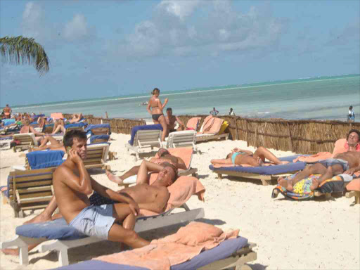 Tourists enjoying their holiday at jacaranda Beach Resort in Watamu. /Alphonce Gari