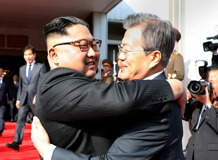 Moon Jae-in, right, and Kim Jong-un share a parting hug after their summit in Panmunjeom truce villiage, just north of the de facto border with South Korea, on May 26 2018. File photo: REUTERS