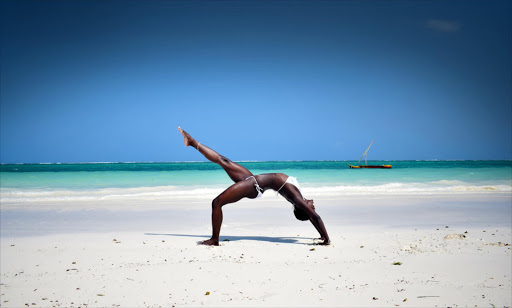 The Africa Yoga Project has educated, empowered and expanded the employability of youth in 15 African countries. Shutterstock