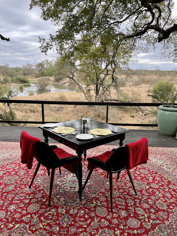 Dining area with a sublime view of the waterhole.