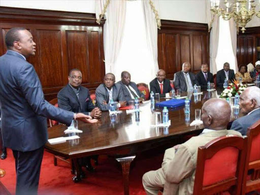President Uhuru Kenyatta accompanied by Governor Kidero talks to Key businessmen from Murano'a county on Saturday. photo/COURTESY