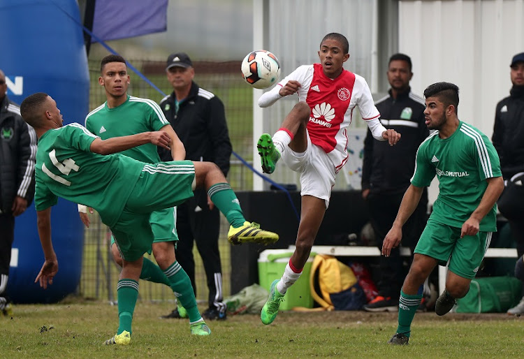 Tashreeq Matthews of Ajax Cape Town battles for the ball with Chadley Smith of Old Mutual Academy in the final of the 2017 Engen Knockout Challenge Cape Town at Parow Park, Parow, Cape Town on 2 July 2017.