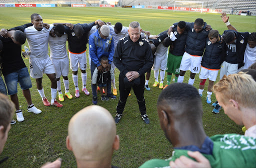 Sammy Troughton (Head Coach of Stellenbosch FC) praying with the team after the National First Division match between Stellenbosch FC and Santos FC at Athlone Stadium on May 14, 2017 in Cape Town, South Africa.