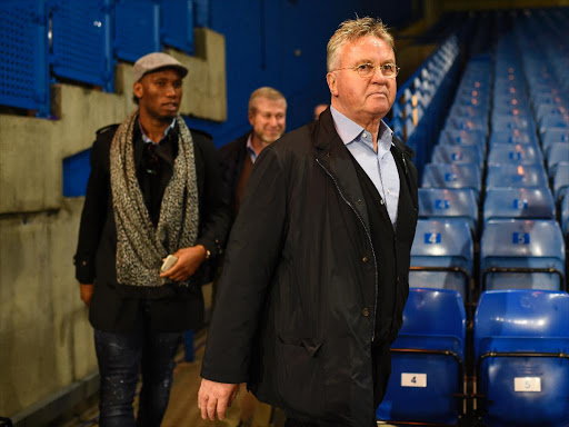 New Chelsea manager Guus Hiddink, Didier Drogba and owner Roman Abramovich after the game. Photo/Reuters