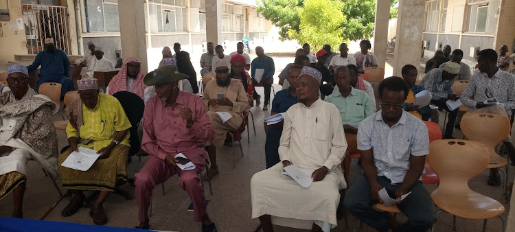 Members of the public in Garissa follow proceedings during the meeting convened by the committee on trade, industry and Investment.