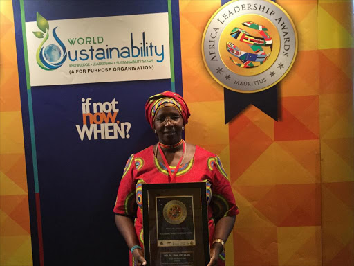 Anti-FGM Board chairperson Linah Kilimo after receiving the award on FGM in Mauritius on December 9th.