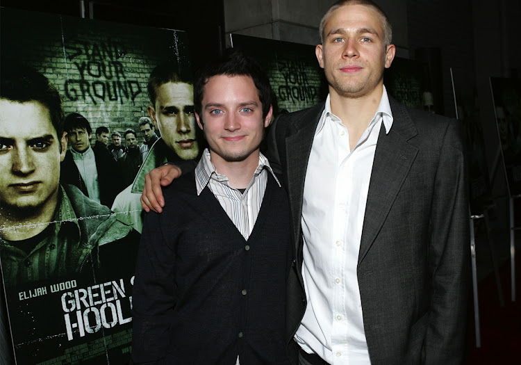 Lead actors Elijah Wood and Charlie Hunnam attend premier of 'Green Street Hooligans'