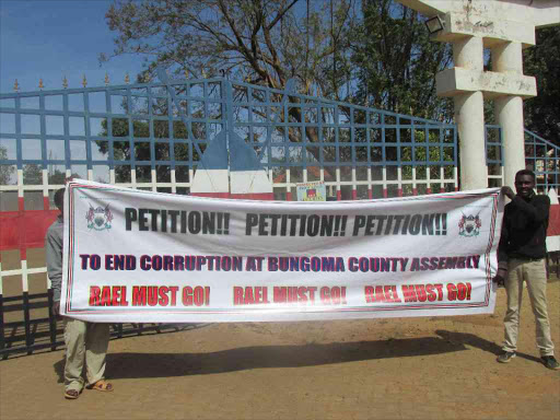 A banner that civil rights groups in Bungoma county used to protest against Rael Khisa's membership in the Public Service Board, February 13, 2018. /BRAN OJAMAA