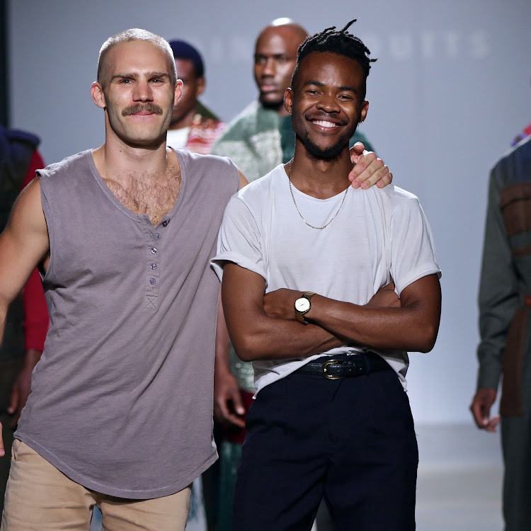 Designers Lukhanyo Mdingi, centre, and the late Nicholas Coutts, left, presented a collaborative collection at SA Menswear Week in 2016. Mdingi's latest collection is a tribute to Coutts.