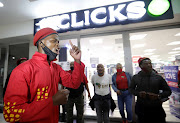 Members of the EFF blocked the entrance to the Clicks outlet in the Goodwood Mall in Cape Town. 