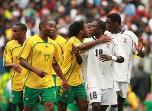 9 September 2007, Benni McCarthy and Billy Mwanza having words during the African Cup of Nations qualifier match between South Africa and Zambia held at Newlands Stadium in Cape Town, South Africa. Photo by Gallo Images