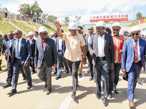 President Uhuru Kenyatta on an inspection tour of works at the Phase2 of the standard gauge railway in Ngong on December 16, 2017 /FILE