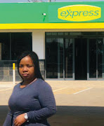 Queen Majola gracefully journeyed from cashier to filling station dealer.