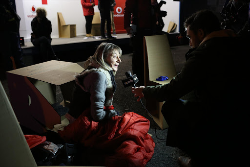 Sue Fox, MD of Estee Lauder, is interviewed in a box at the inaugural 702 Sun International CEO SleepOut in June 2015. Business leaders slept on the streets, in solidarity for the cause of South Africa's most vulnerable children.