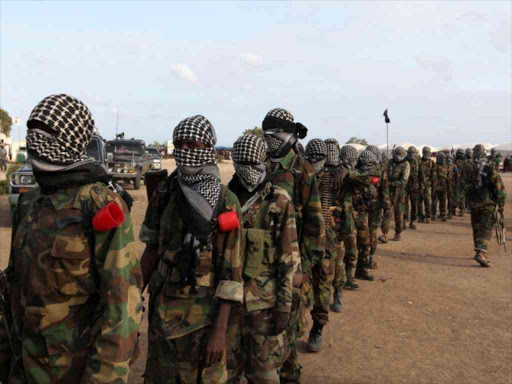 Members of al Shabaab parade at Ala Yaasir camp, outside of Somalia's capital Mogadishu, September 3, 2011. REUTERS/Feisal Omar