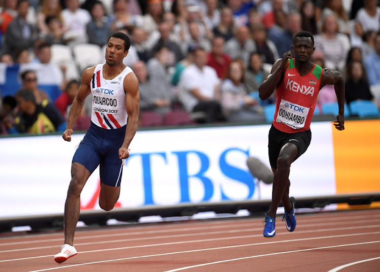 Mark Otieno Odhiambo of Kenya in action alongside Jonathan Quarcoo of Norway at the World Athletics Championships in 2017.