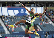 South Africa's sensational long jumper Rushwahl Samaai leaps to a bronze medal during a men's event at the Commonwealth Games at Hampden Park Athletics Stadium in Glasgow, Scotland, yesterday. His teammate, Zarck Visser, grabbed a silver.