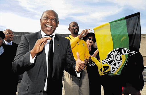 Tokyo Sexwale with the Nelson Mandela Bay ANC regional chairman, Nceba Faku, and ANC Veterans League members at the Emlotheni memorial site. File photo.