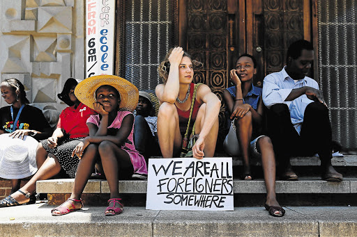 Jean Bovyat, who is French, took part in a march organised by the African Diaspora Forum and the police in Yeoville, Johannesburg, yesterday to highlight the importance of social cohesion after last week's xenophobic attacks in Soweto.