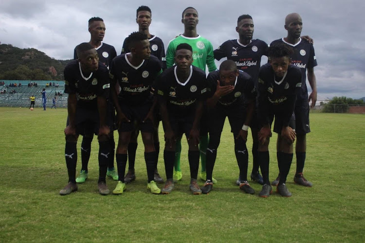 Passion FC players line up for a team photo ahead of their ABC Motsepe League Mpumalanga province match on January 24 2020.