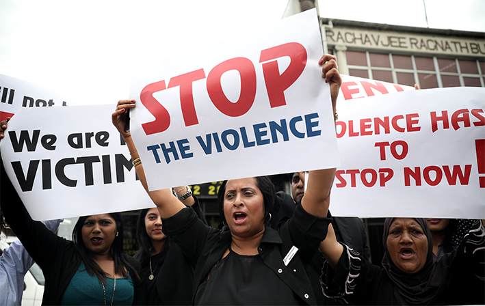Women outside the Verulam magistrate's court on Monday during a picket in support of the 16 days of activism against the abuse of women and children. A Durban law firm has offered free legal assistance during the 16 days to women and children who have suffered abuse.