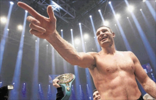 UNDISPUTED: Ukrainian WBC heavyweight champion Vitali Klitschko celebrates his victory over British challenger Dereck Chisora last Saturday. PHOTO: REUTERS