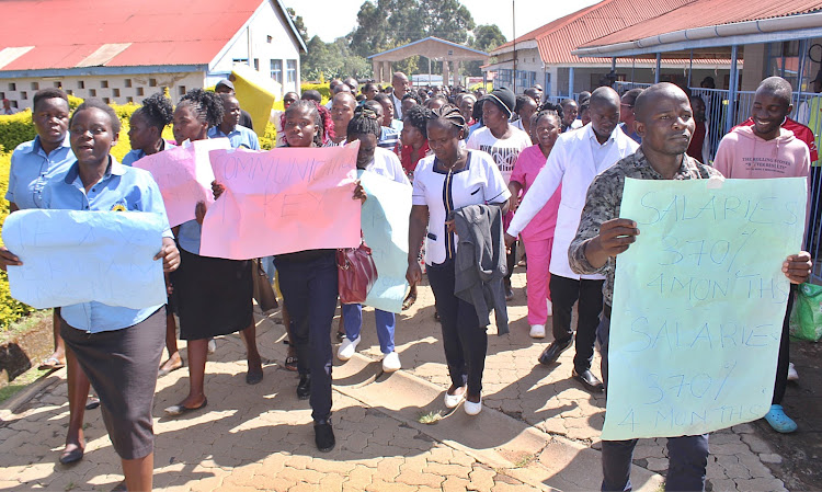 The staff of St. Elizabeth Hospital Mukumu in Kakamega demonstrating in demand of their over 5 months delayed salaries at the hospital on Monday