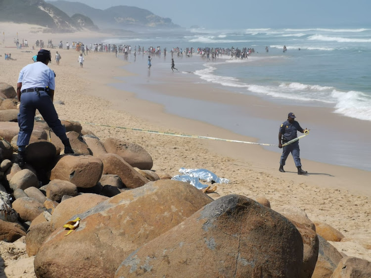 Police cordon off the area where two children from Mthatha drowned at Eastern Beach in East London.