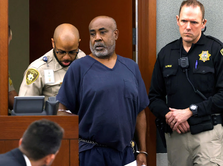 Duane Davis, a former gang member charged in the 1996 murder of hip-hop star Tupac Shakur, is led into the courtroom during his arraignment at the Regional Justice Center in Las Vegas, Nevada