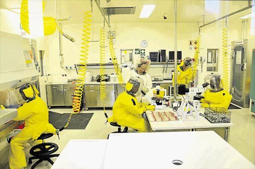 Workers at Africa's only biosafety level 4 lab, in Sandringham, Johannesburg