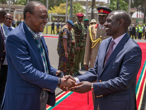 President Uhuru Kenyatta and Deputy President William Ruto at Jomo Kenyatta International Airport. Uhuru left for Lomé, Togo, to attend a special session of the Assembly of the Africa, Union on Maritime Security, Safety and Development / PSCU