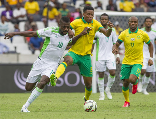 Bongani Zungu of Bafana Bafana challenges Ogu John Ugochukwu of Nigeria during the International Friendly match between South Africa and Nigeria at Mbombela Stadium. Picture Credit: Gallo Images