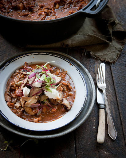 Slow-cooked brisket with wild mushrooms.