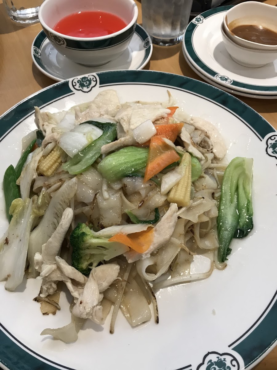 Chicken and veggie with thick rice noodles plus white sauce with a side of sweet ‘n sour (very good!)