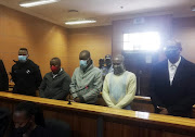 A husband Thabo Leshabane (black jacket) and his four co-accused appeared in the Polokwane Magistrate's Court for his wife's murder.