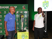 Vaal University of Technology FC coach Stanley Nkoane (L) with his Mamelodi Sundowns counterpart Pitso Mosimane during the Nedbank Cup media briefing in Sandton on February 20 2020.  