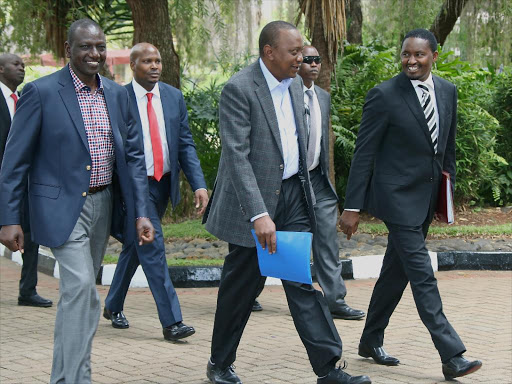 President Uhuru Kenyatta, DP William Ruto and Devolution CS Mwangi Kiunjuri at the venue for the Fifth National and County Government Coordinating Summit at State Lodge, Sagana. Photo/PSCU