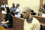 TOGETHER AND APART: Jean-Pierre Malan, right, and former stripper Maruschka Robinson in the Randburg Magistrate's Court.