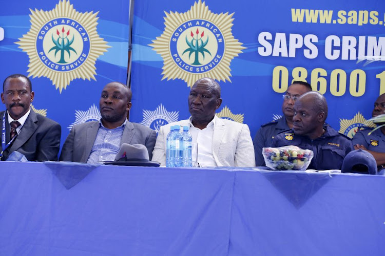 From left: Head of the Directorate for Priority Investigation (Hawks) Lieutenant General Advocate Godfrey Lebeya, KZN MEC for Transport, Community Safety and Liaison Mr Mxolisi Kaunda, Police Minister Bheki Cele and SAPS National Commissioner General Khehla Sithole pictured during an imbizo to respond to the community demands raised after the fatal shooting of a nine-year-old Sadia Sukraj.