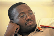 INVESTIGATING:
       Brigadier General Xolani Mabanga